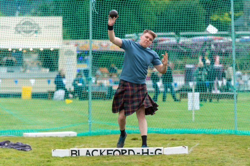 Mace Paterson competes in the Shot Putt competition