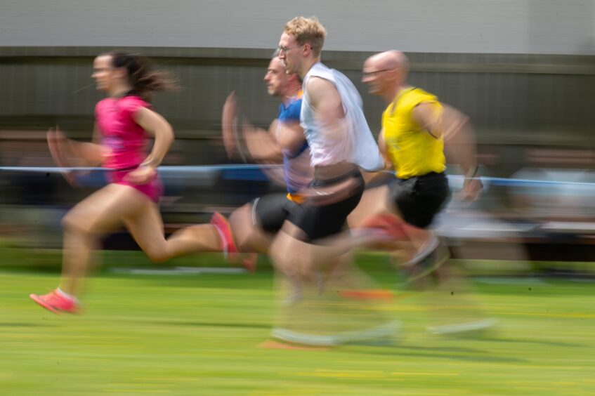 Finalists run in a race
