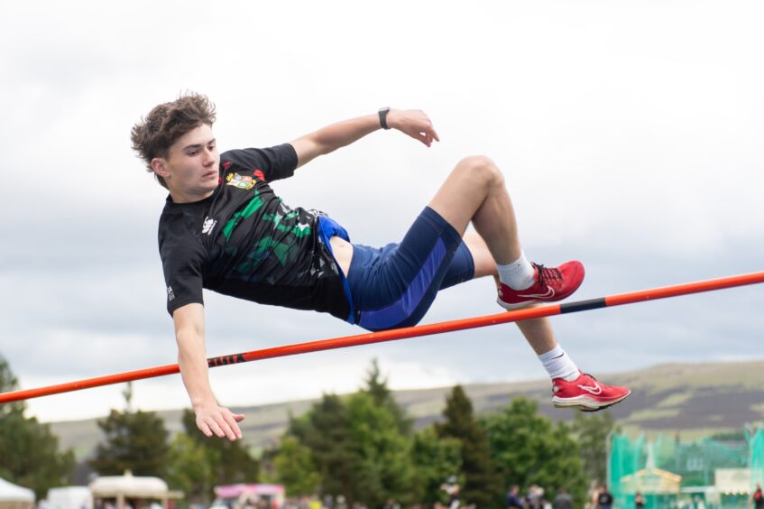 Stuart Whiteford on the high jump.