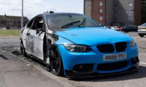 One section of the vehicle looks untouched, while the other is burnt out. Image: Kim Cessford/DC Thomson