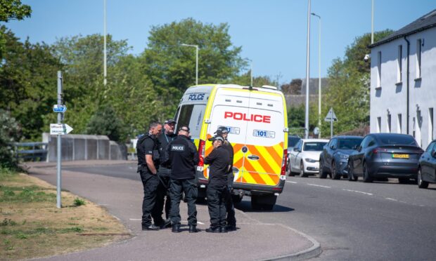 Officers at the scene on Thursday afternoon.