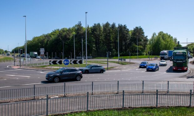 CR0053328, Finn Nixon, Dundee. Would it be possible to get some photographs of the road markings and signs on the western approach to the Swallow Roundabout and at the roundabout itself in Dundee? The western approach pictures would be on the stretch of road between the Invergowrie slip road/layby and the roundabout. Picture Shows, general view of the Swallow Roundabout showing the western and southern approaches, A90, Dundee, 14th May 2025. Image: Kim / DC Thomson