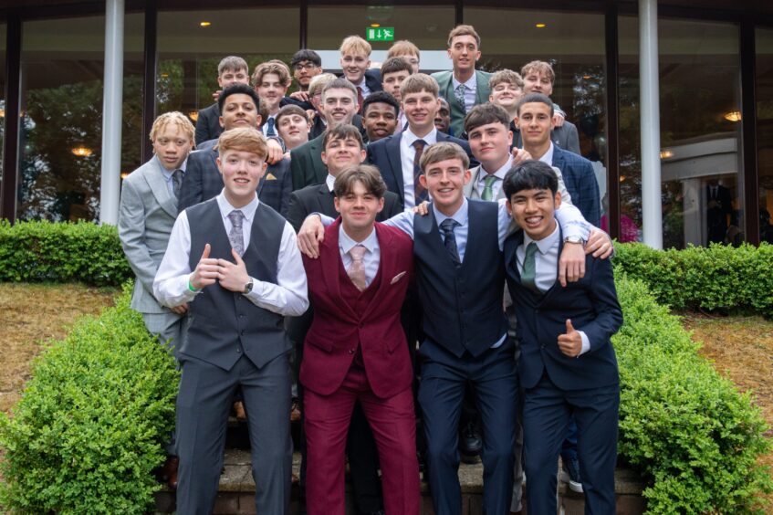 A group of boys pictured outside the hotel.