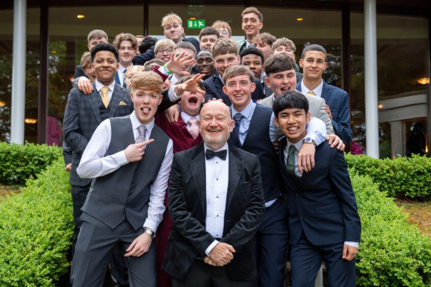 A group of  boys with their head teacher, Sean Hagney, in the centre