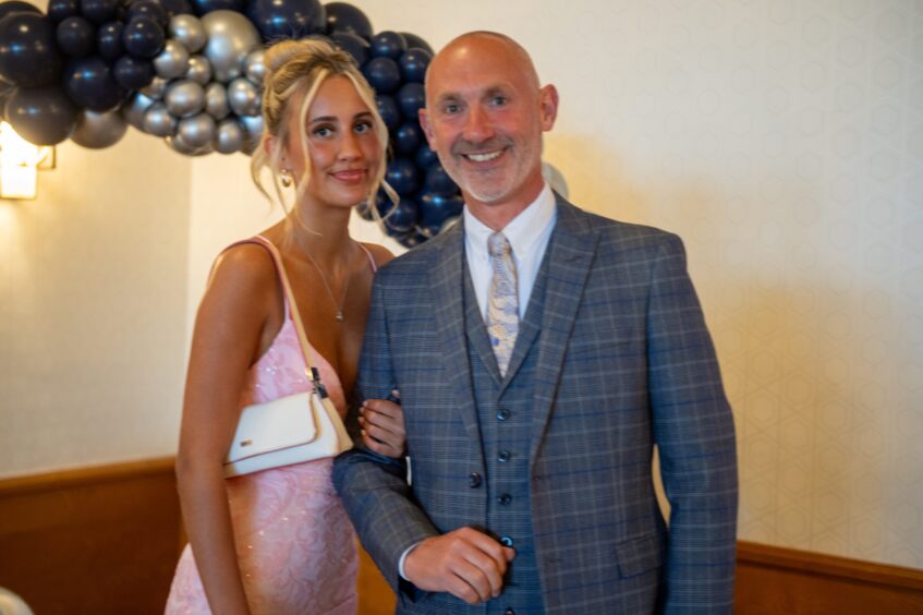 Head girl, Monica Cecil, with her dad, David Cecil, a teacher at the school.