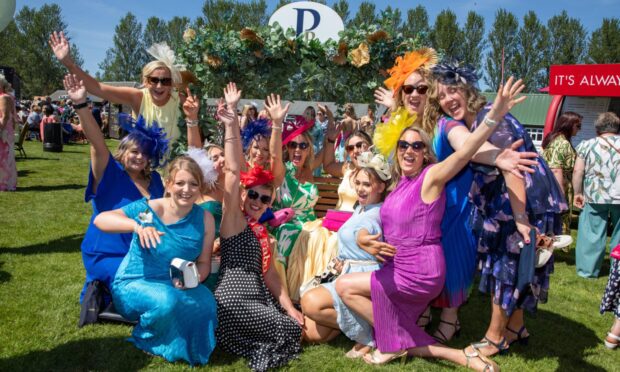 Edinburgh Gin Ladies Day at Perth Races drew thousands of racegoers, all dressed in their finest on a glorious spring day.
 Image: Kenny Smith/DC Thomson