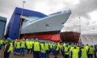 HMS Venturer emerges from the build hall at Rosyth docks for the first time. Image: Kenny Smith/DC Thomson