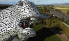 Charity abseilers will emerge from the mouth of one of the Kelpies. Image: Supplied