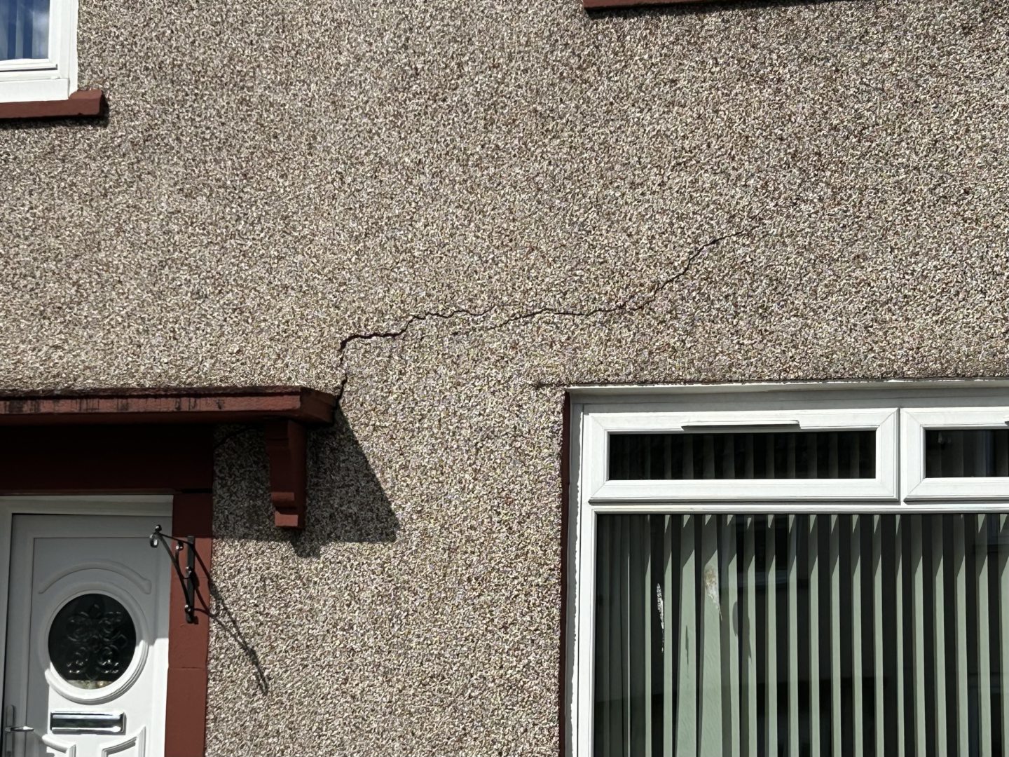 Subsidence damage and cracking affecting one of the houses.