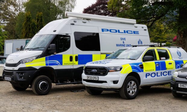 Police vehicles on the scene of the major search at Loch Ard. Image: Mark Ferguson