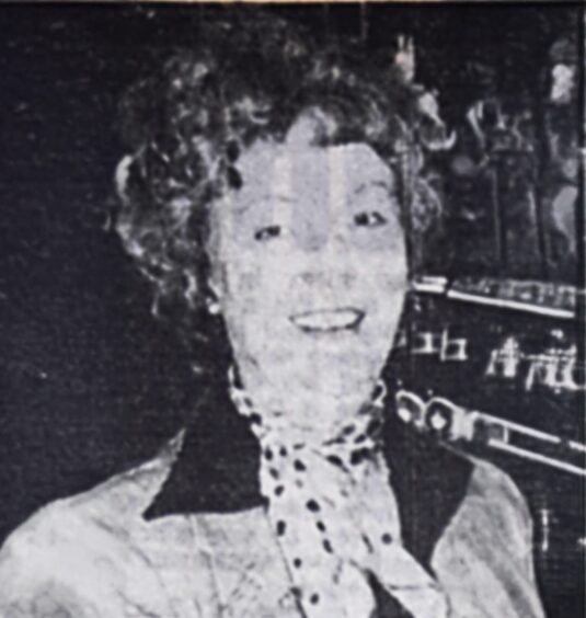 a smiling May Allan