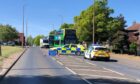 Police shut Pitkerro Road for around 30 minutes. Image: James Simpson/DC Thomson