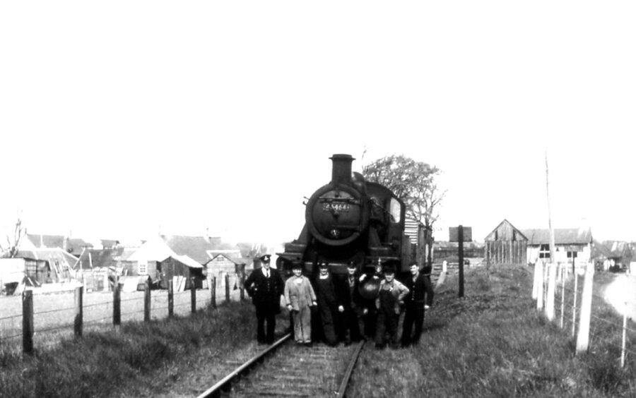 The last train on the Carmyllie branch on May 19, 1965. Posing with the train crew at Carmyllie is No 46464’s future owner, Ian Fraser (second right).