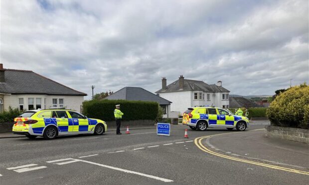 Police have shut Old Glamis Road following the collision