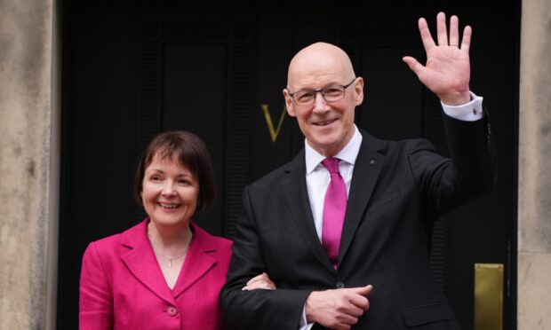 John Swinney, with his wife Elizabeth Quigley, on the steps of Bute House. Image: PA