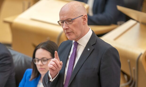 John Swinney delivering his programme for government statement. Image: PA.