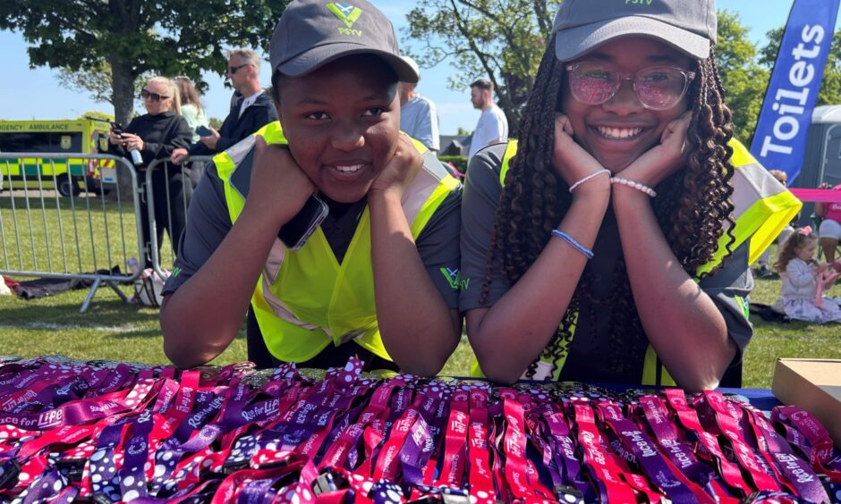 Police Scotland youth volunteers Avril Ganyani, 13, and Amanda Aliu, 13