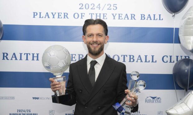 Dylan Easton clutches multiple awards from Raith Rovers' player of the year ball.