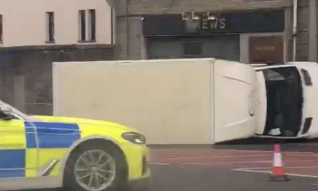 The van overturned on Moncur Crescent in Dundee.