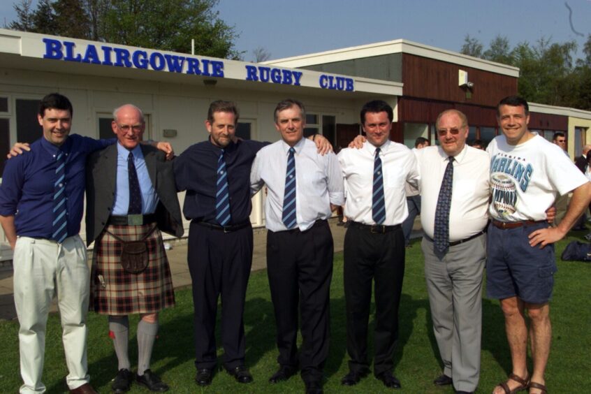 Blairgowrie rugby club opening sees seven men pictured outside the building