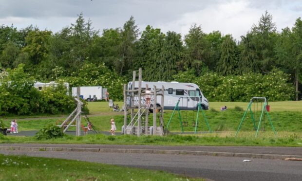 Travellers parked on Western Edge Park play area in Perth.