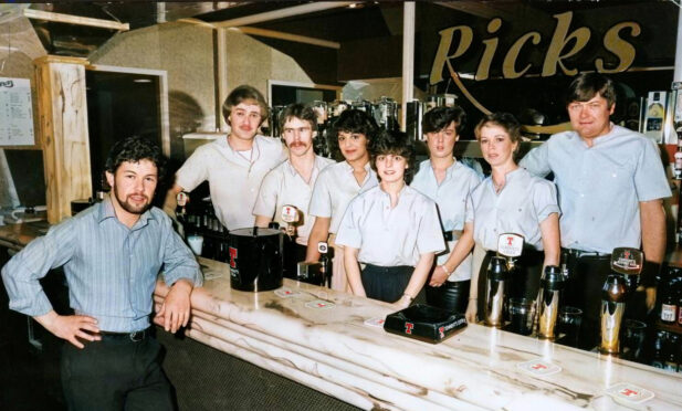 Staff behind the bar and ready to serve Rick's Disco customers in May 1983