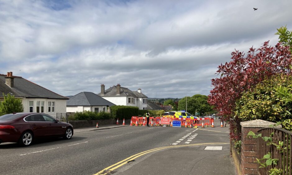 Old Glamis Road is closed after the crash involving a pedestrian