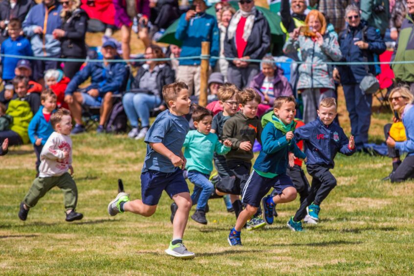 Small boys running in casual gear