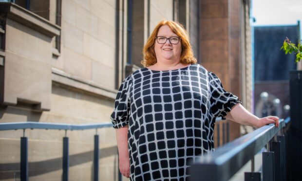 Helen Smout on steps outside Perth Museum