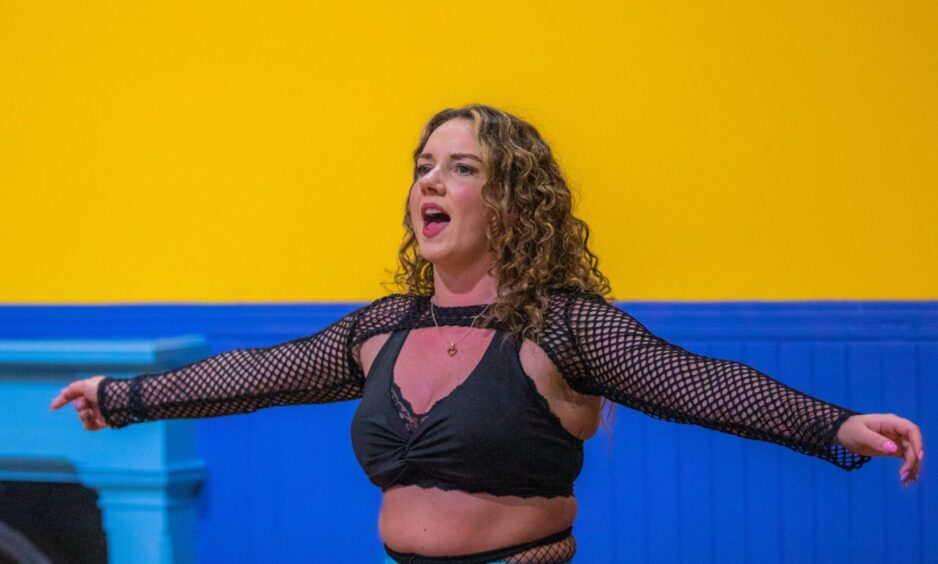 Ellen Ryder singing at Thomson-Leng Musical Society rehearsal