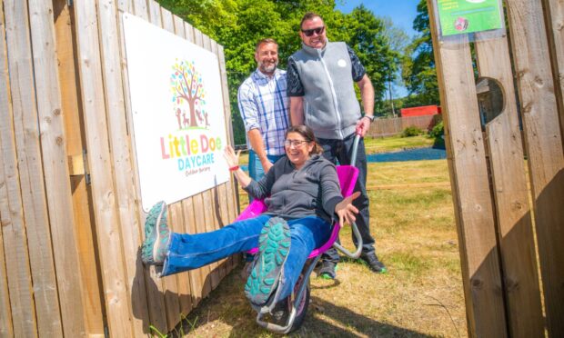 The Scottish Deer Centre is opening a nursery called Little Doe Daycare. Picture shows nursery manager Kath Webster in a pink wheelbarrow, pushed by park owners Gavin Findlay, left and David Hamilton.