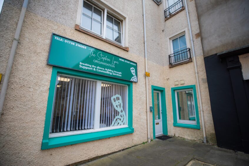 Ground floor premises with green Stephen Logo Organisation logo above window