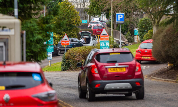 Cars in the parking area outside Ninewells Hospital.