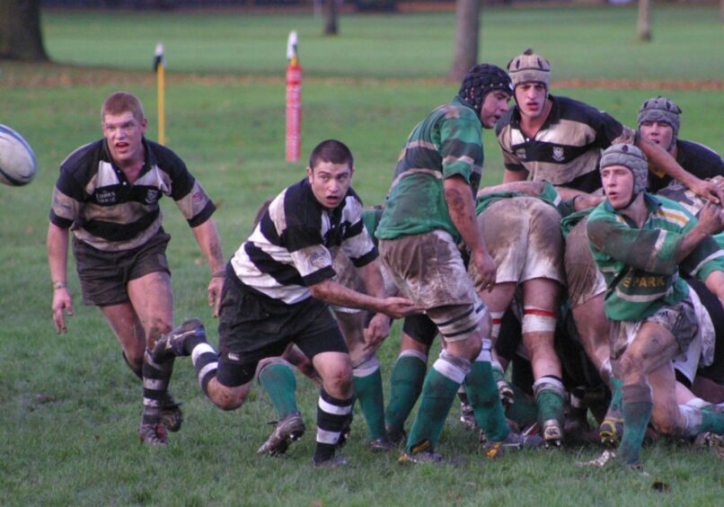 Match action from Perthshire versus Caithness in November 2005. A player throws the ball after a scrum