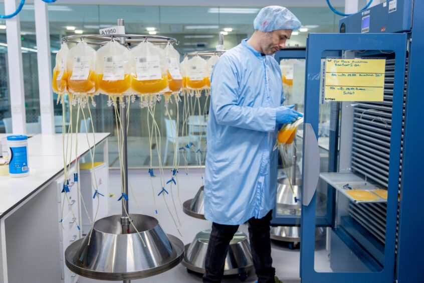 A worker placing platelets into storage at the Jack Copland Centre, Edinburgh.