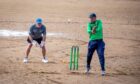 Ally McCoist playing cricket at Elie beach. Image Steven Brown/DC Thomson