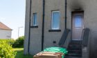 Smoke damage was visible above the front door of the Kelty flat fire
