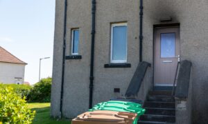Smoke damage was visible above the front door of the Kelty flat fire