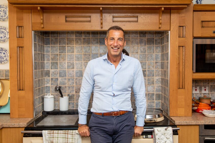 Robert Graham in original farmhouse kitchen