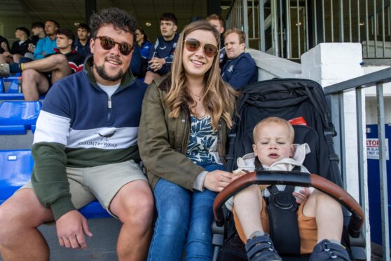 Ross, ALysa and Reuben (2) enjoy the rugby at Howe of Fife Rugby Club in Cupar. Image: Steve Brown/DC Thomson