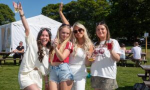 Kinross girls Erin Winton, Lauren Graham, Erin Sharp and Isla Prentice lapping up the sunshine  at Kinross Beer Garden and Funfair today. Image: Steve Brown/DC Thomson