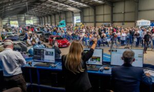 Auctioneers get the bids in for the 1995 Toyota Celica today at the Morris Leslie Classic Car Auction at Errol Airfield. Image: Steve Brown/DC Thomson