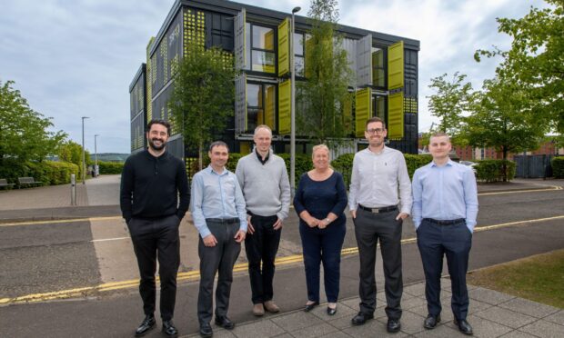 Jonathan Reeve, Maureen King, Lee Fotheringham, Kenny Falconer, Robert Burness and Josh Burt of Voigt Architects at the new District 10 office in Dundee. Image: Steve Brown/DC Thomson