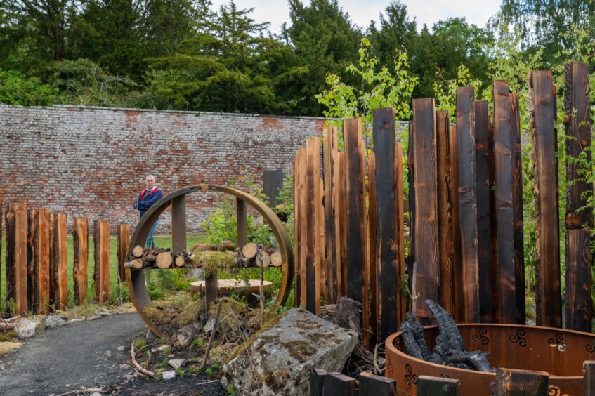 Garden display featuring charred timber