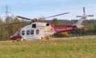 A coastguard helicopter at Lundie Craigs near Coupar Angus. Image: Lucy Scarlett/DC Thomson