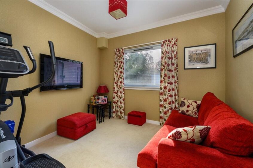 The sixth bedroom is currently used as a sitting room. 