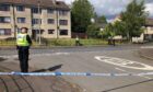 Police on St Clement Place, St Mary's, Dundee.