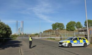 Police have sealed off Stannergate Road in Dundee.