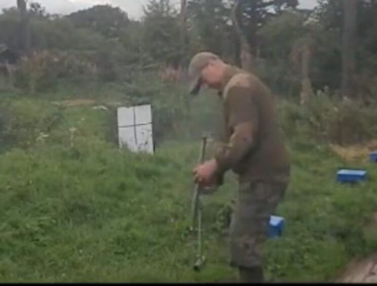 Stephen Mellor with homemade shotgun
