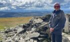 Image shows: Author Sue Lawrence at the summit of Dreish, a Munro west of Glen Clova.